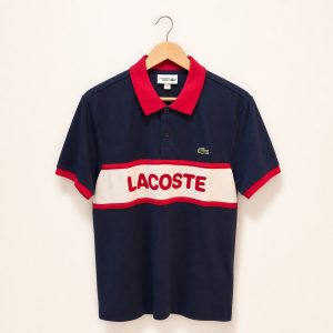 Polo Lacoste Sport azul blanco y rojo talla S, vista frontal