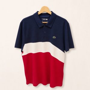 Polo Lacoste Sport color block azul blanco y rojo talla L, vista frontal