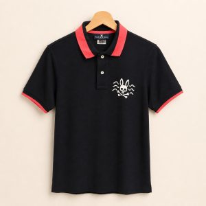 Polo Psycho Bunny negro con detalles coral talla 3, vista frontal