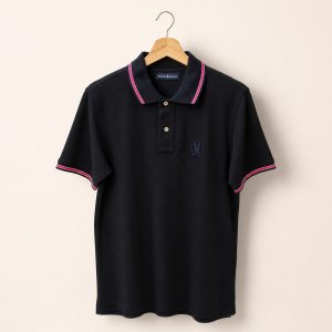 Polo Psycho Bunny negro con ribetes rosa talla 3, vista frontal