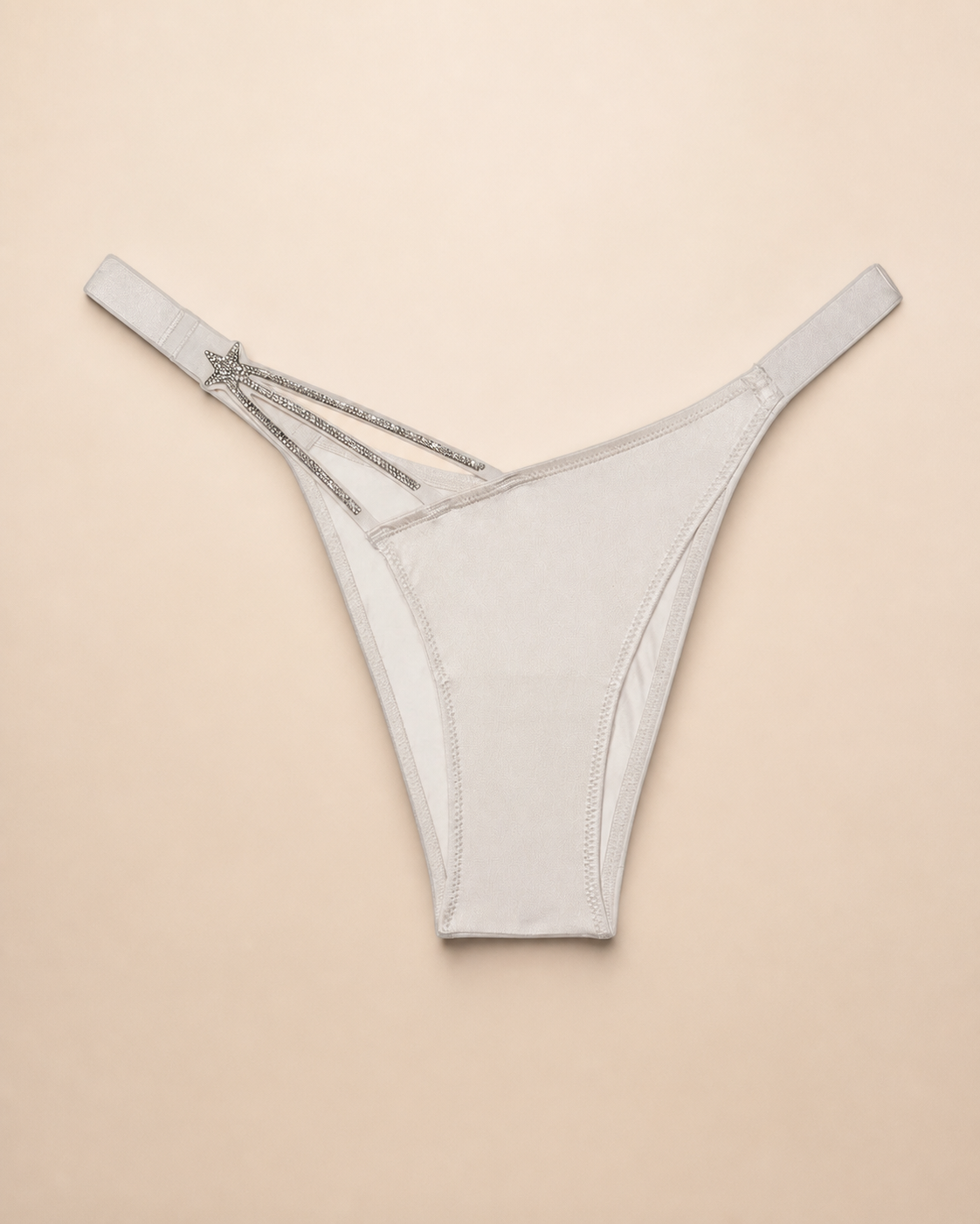 Victoria's Secret panty tanga marfil con tiras y estrella talla M, vista frontal